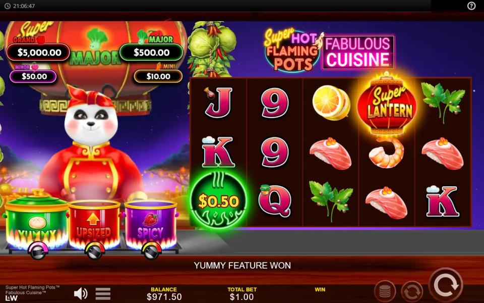 A single green pot scatter on reel 1 with the message bar reading Yummy Feature Won