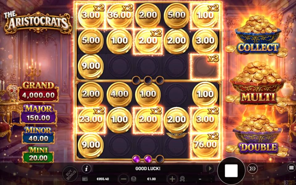 The Aristocrats double board in SUPER HOLD & WIN: coins with x2 marks on both boards and a x3 multiplier sitting on an empty cell of the upper board