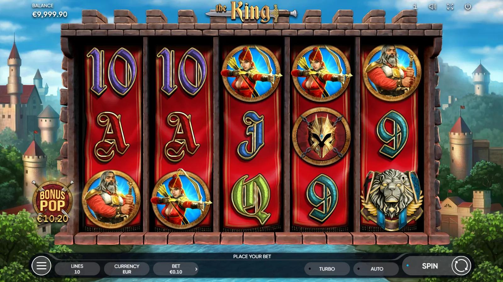 The King gameplay showing 5x3 reels with the king on his throne, a crown, treasure chest and shield on castle battlements