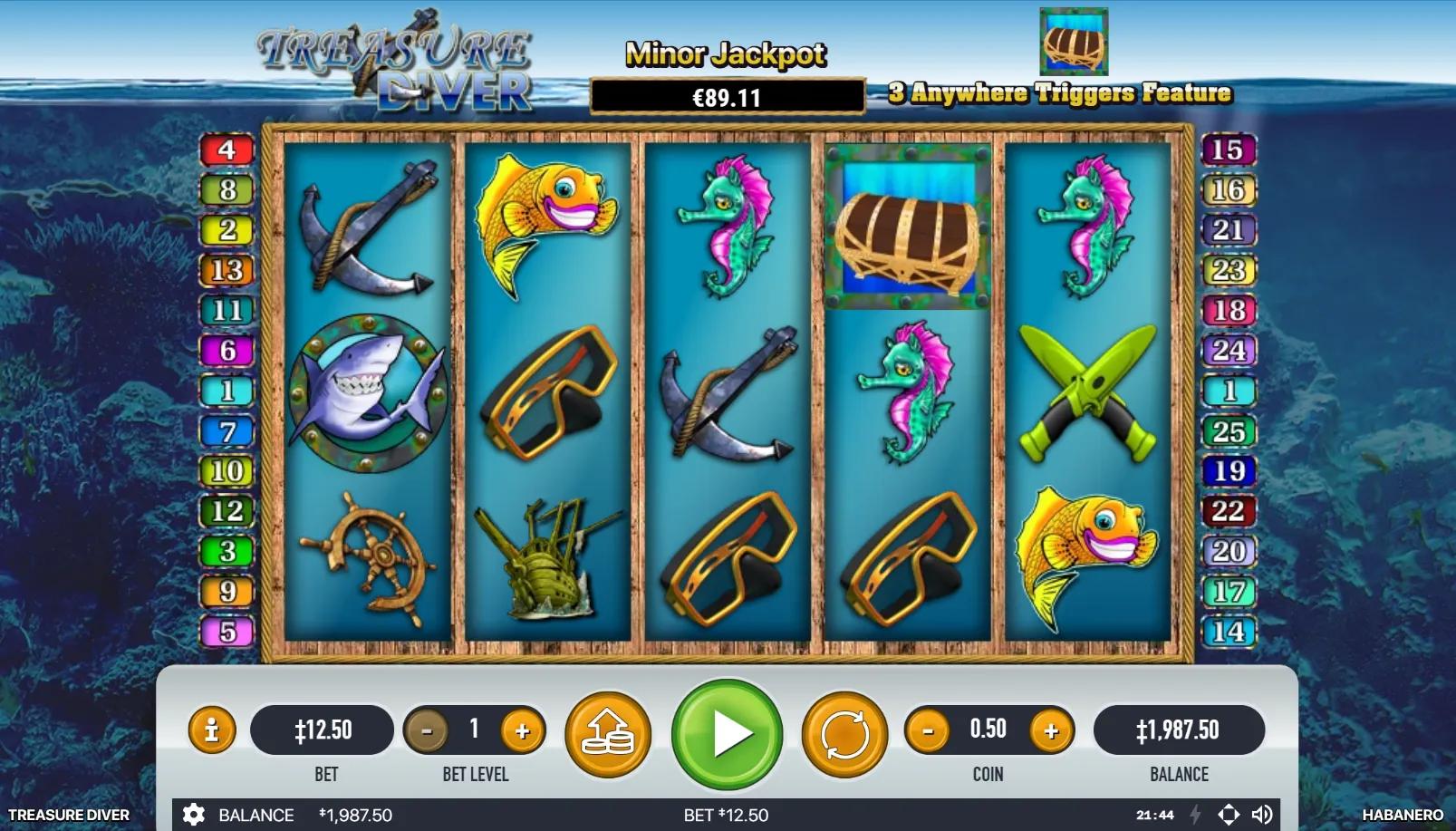 Treasure Diver slot gameplay showing 5x3 grid with scuba diver wild, treasure chest scatter, aquatic creatures, and gold treasure on underwater coral reef backdrop