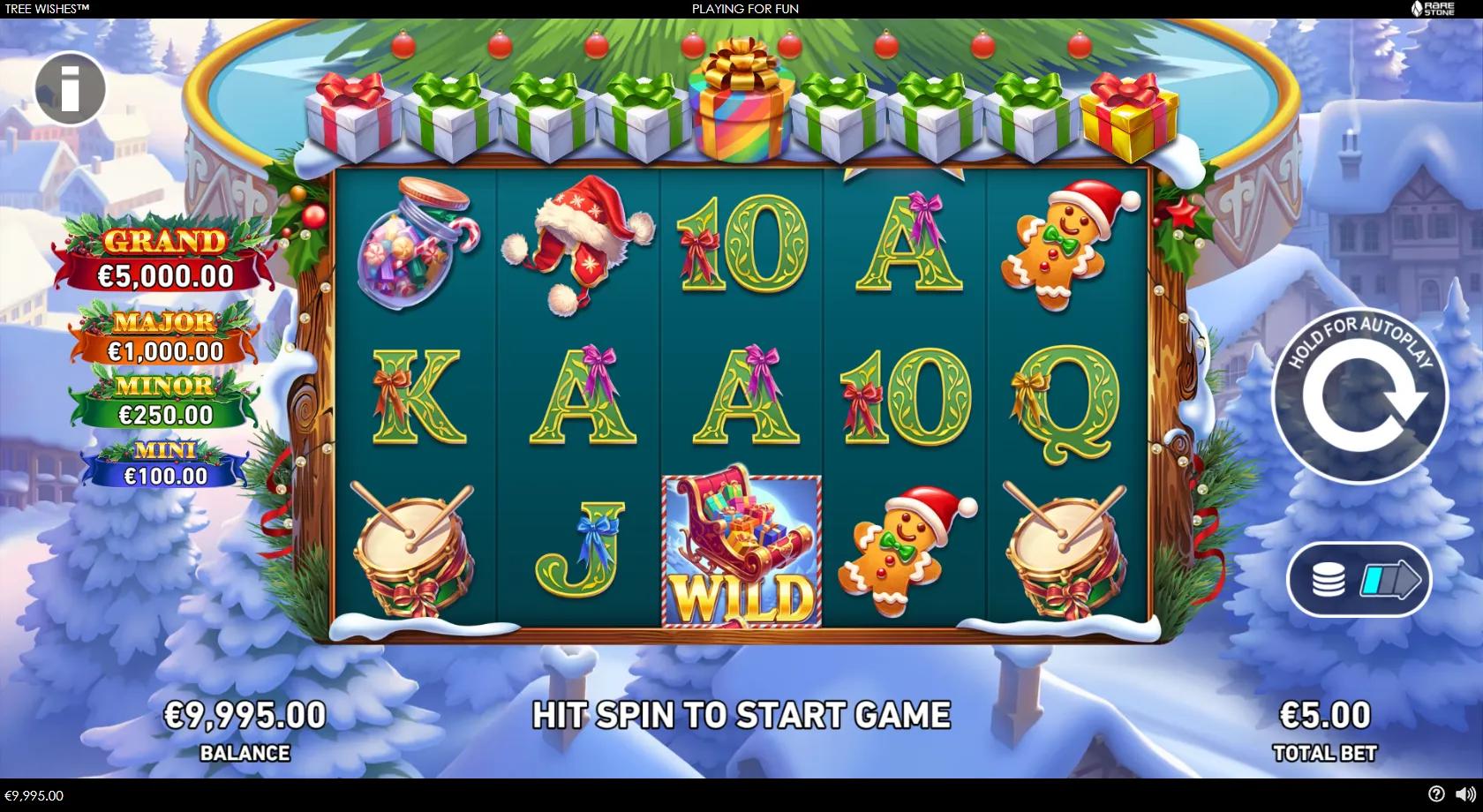 Tree Wishes slot gameplay showing a 5x3 Christmas grid with a sleigh wild, candy jar, Santa hat and gingerbread symbols, a row of gift boxes above the reels and four jackpots