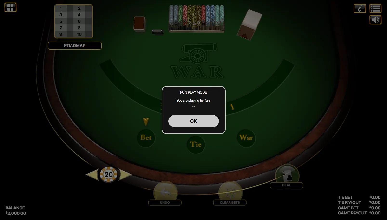 War table game showing dark green felt with Bet/Tie/War betting circles, chip rack, and Roadmap grid for tracking past results