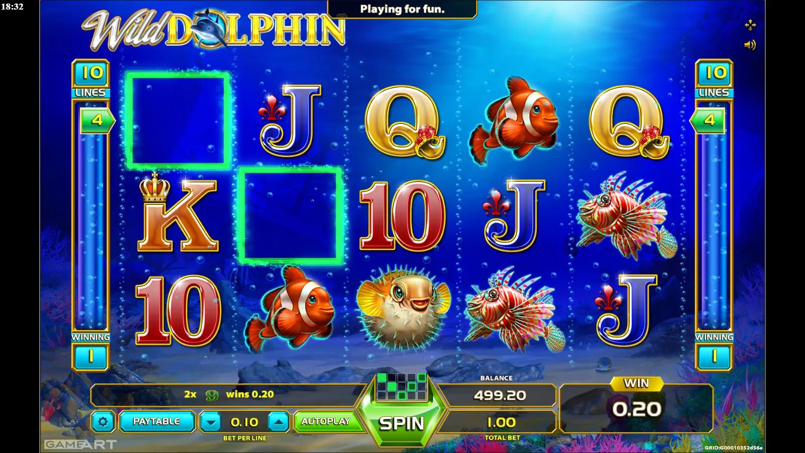 Wild Dolphin slot gameplay showing the 5x3 undersea grid with a dolphin Wild, clownfish, lionfish, turtle and card royal symbols across 10 lines
