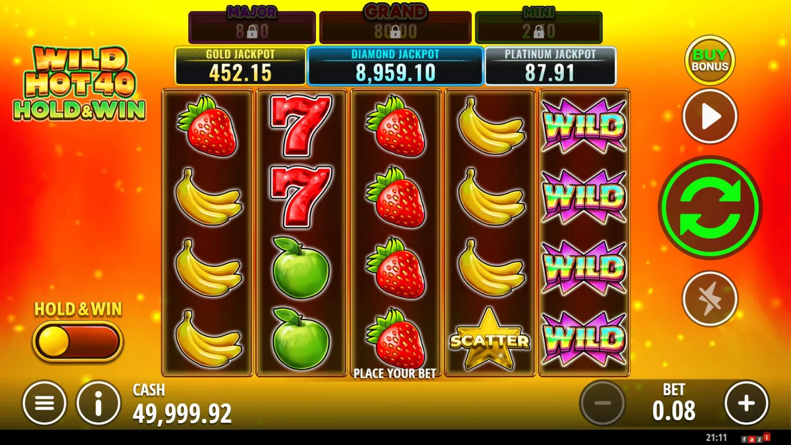 Wild Hot 40 Hold & Win slot gameplay showing 5x4 fruit reels with star wilds, coins and Mini, Major, Grand jackpot meters
