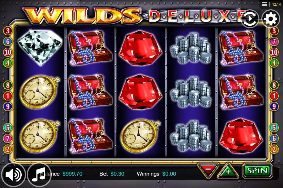 Wilds Deluxe slot gameplay showing 5x3 grid with diamond, red gem and treasure chest jewellery symbols across 10 paylines